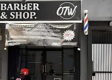 Otw Hairstudio facade in Jawa Barat, ID with barber sign.