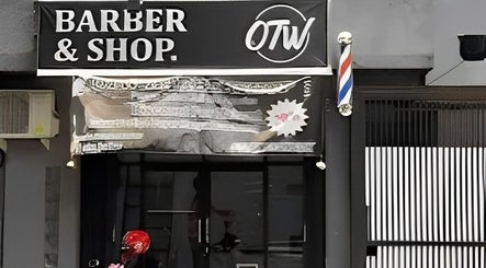 Otw Hairstudio facade in Jawa Barat, ID with barber sign.