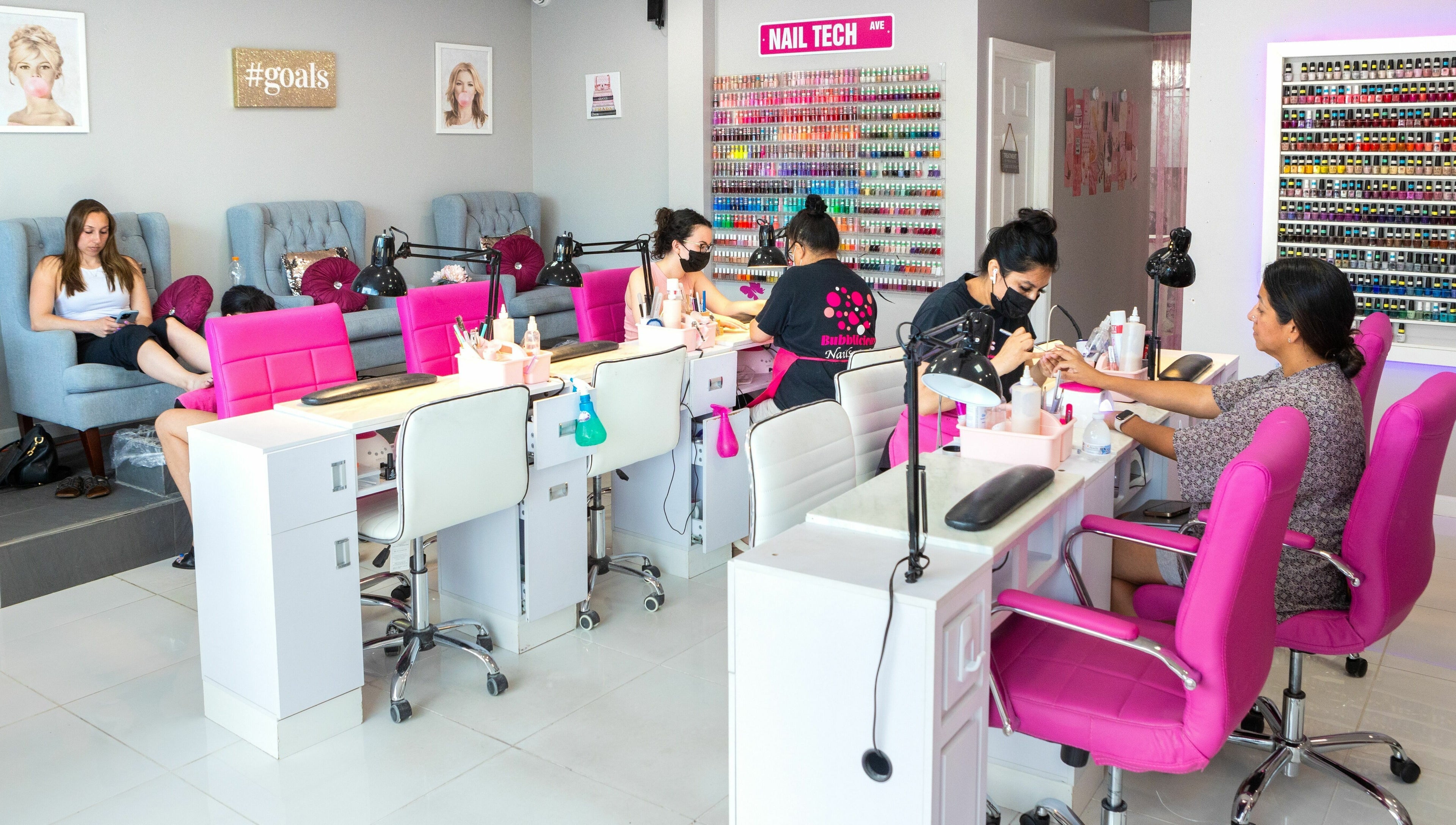 Relaxing manicure at Bubblicious Nails and Spa, New York, New York, US, with vibrant decor and professional nail care.