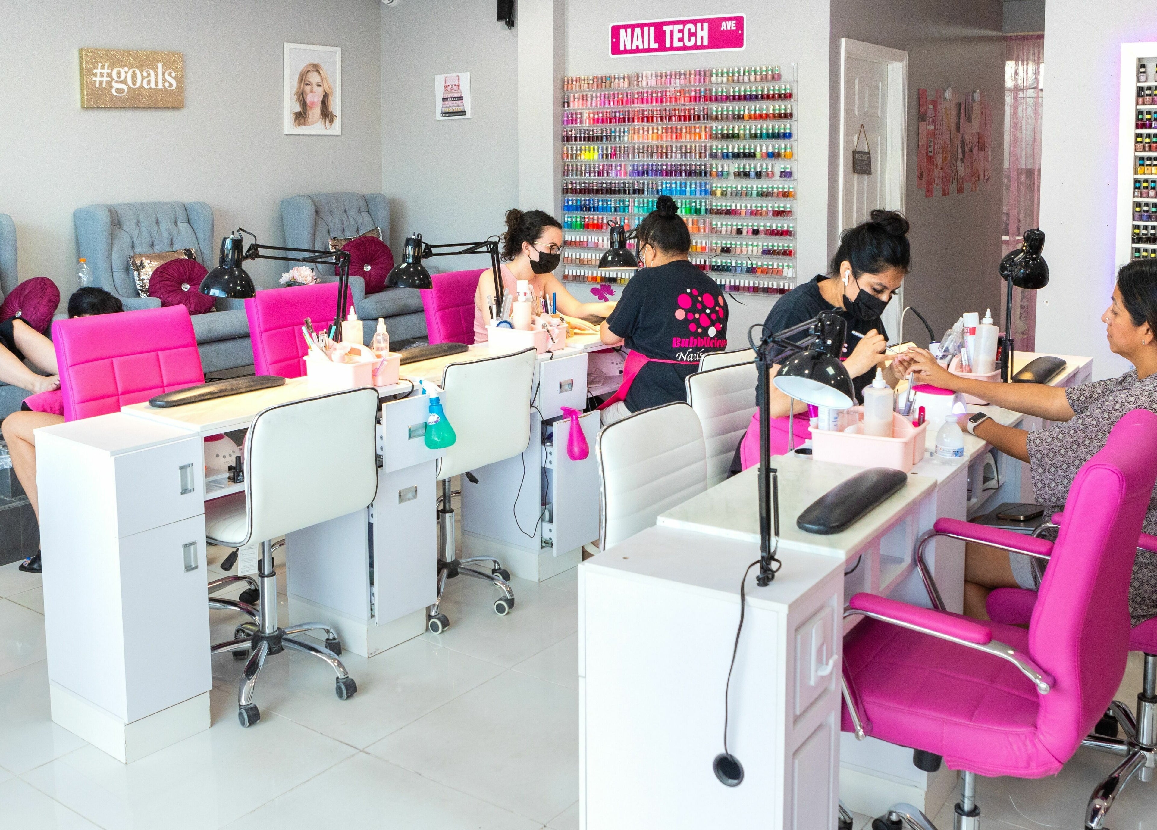 Relaxing manicure at Bubblicious Nails and Spa, New York, New York, US, with vibrant decor and professional nail care.
