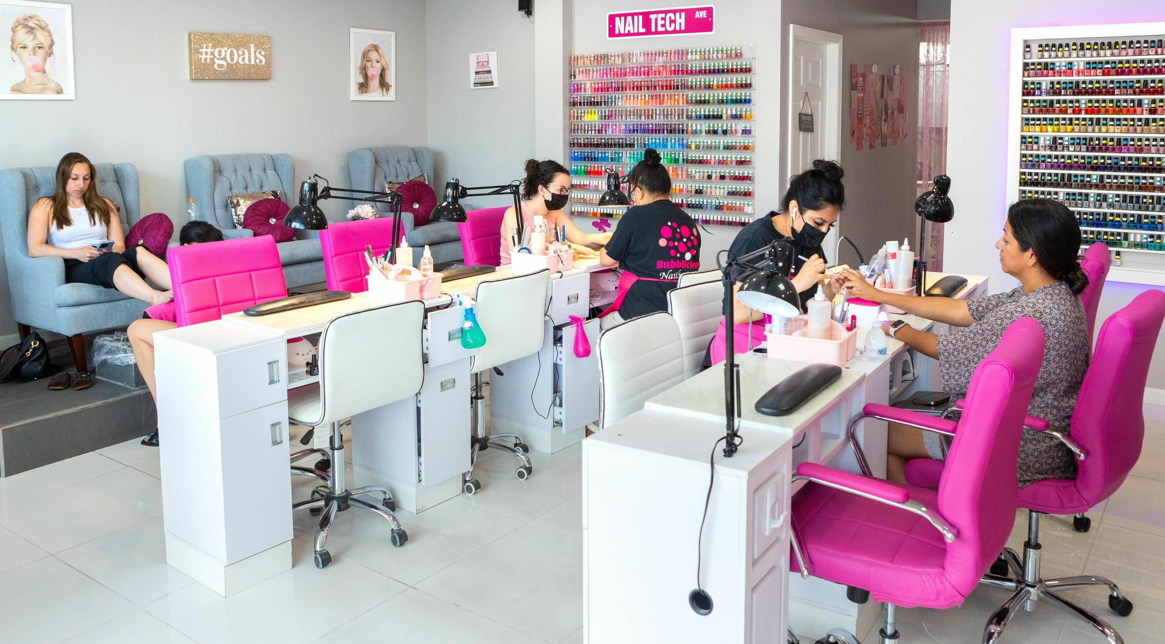Relaxing manicure at Bubblicious Nails and Spa, New York, New York, US, with vibrant decor and professional nail care.