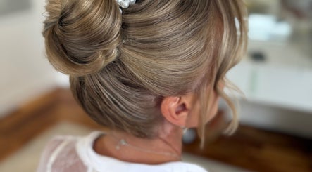 A stylish updo hairstyle created at Finesse Academy of Hair and Holistics in Haydock, England, GB.