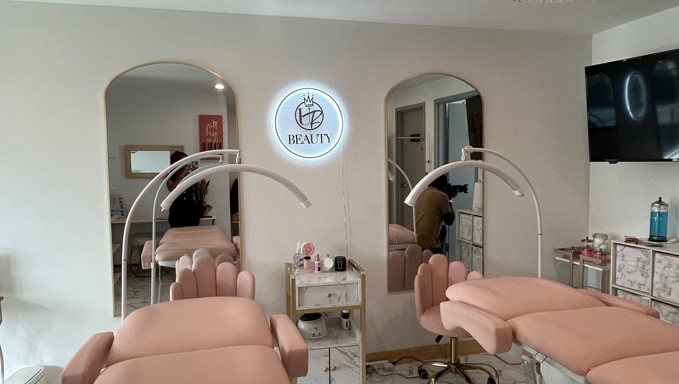 Chic interior of K. Marie Aesthetics Vegas Bookings in Las Vegas, Nevada, US. Soft pink decor with modern aesthetics.