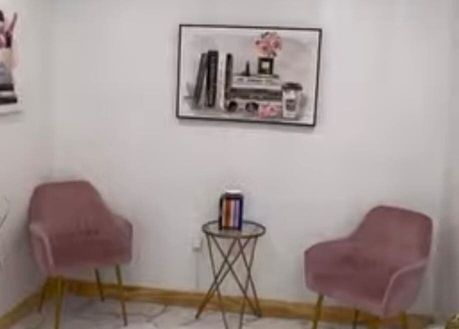 Elegant seating area at K. Marie Aesthetics Vegas Bookings, Las Vegas, Nevada, US with plush chairs and decor.