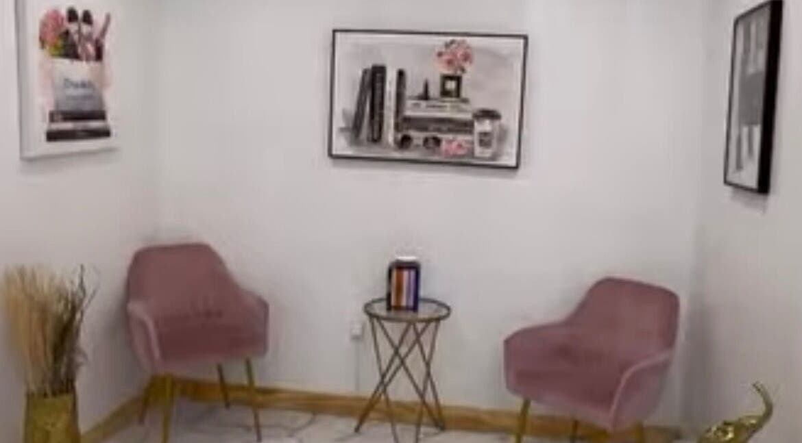 Elegant seating area at K. Marie Aesthetics Vegas Bookings, Las Vegas, Nevada, US with plush chairs and decor.