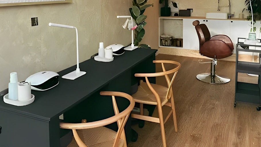 Modern beauty station at Hue Beauty in Bristol, England, GB, featuring sleek design and comfortable seating.