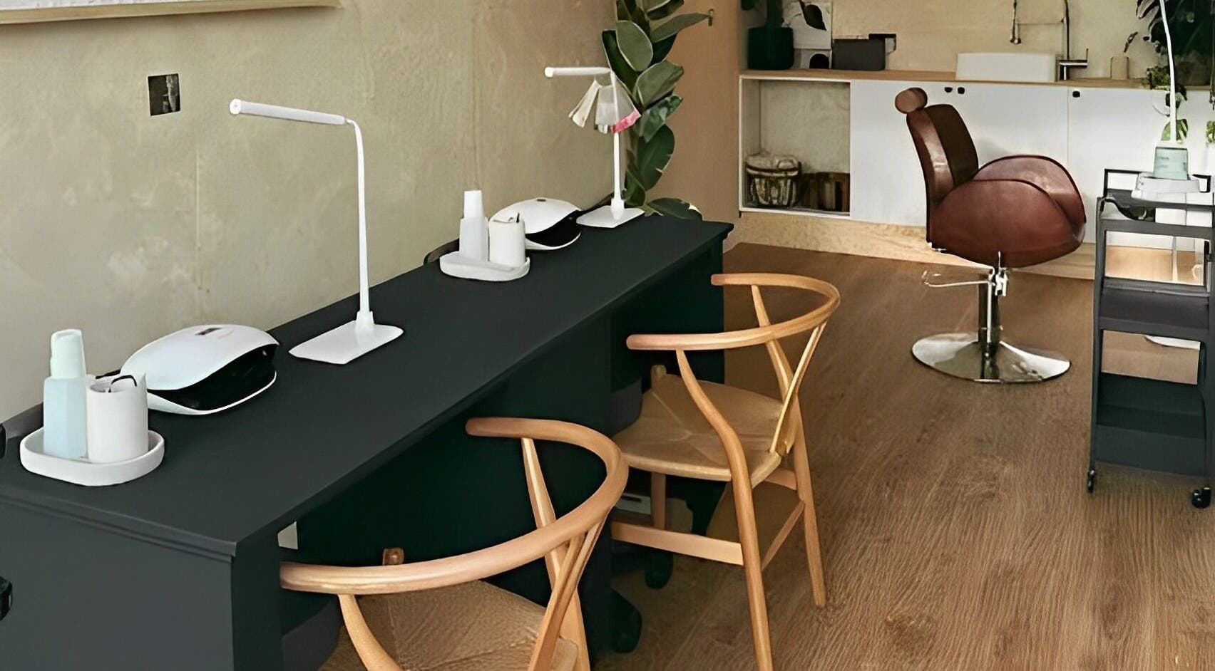 Modern beauty station at Hue Beauty in Bristol, England, GB, featuring sleek design and comfortable seating.