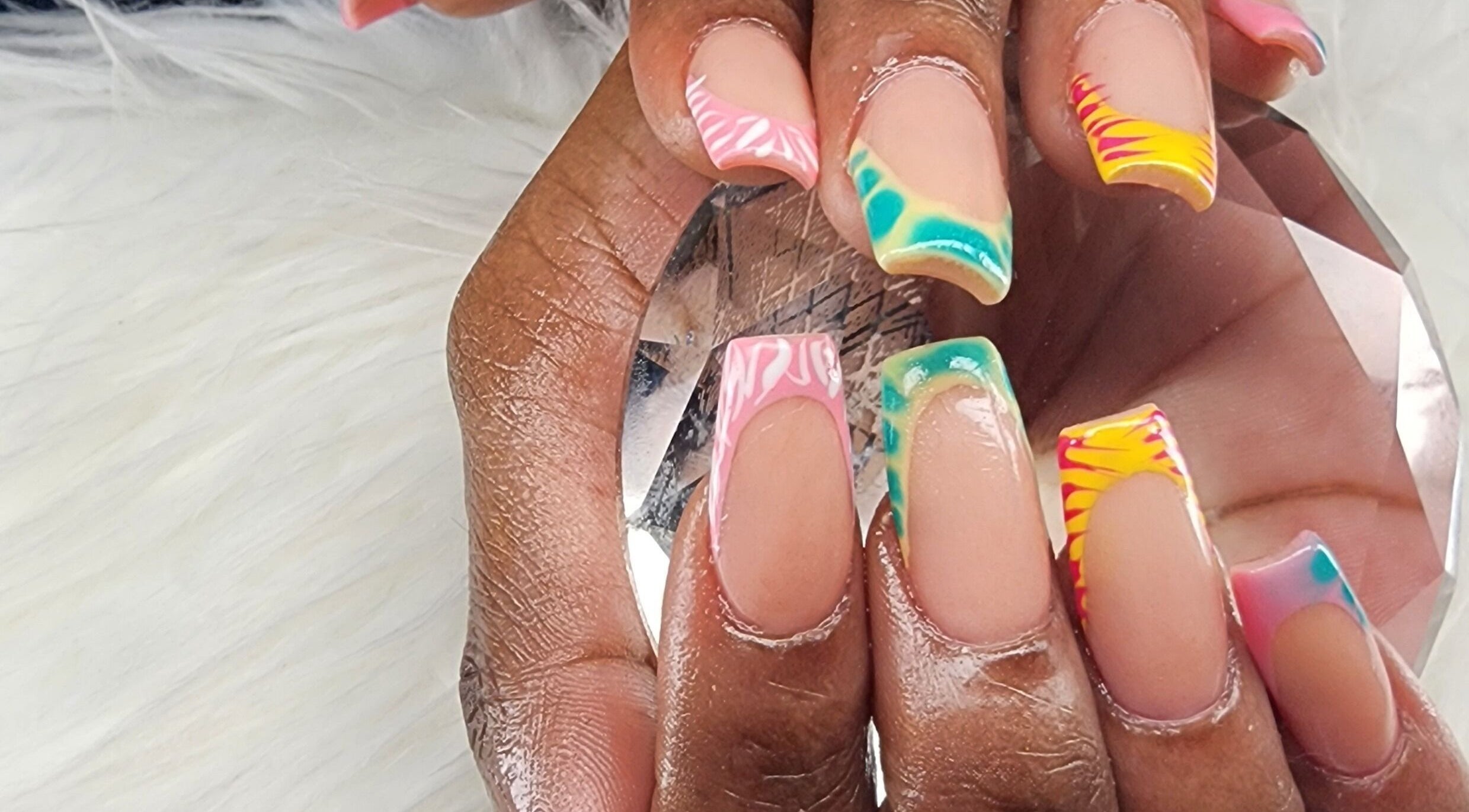 Creative nail art design by Toyazz Touch Of Beauty in Ocho Rios, St. Ann Parish, JM showcasing vibrant colors.