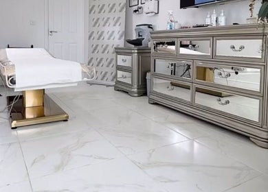 Elegant treatment room at Aesthetics By Rachel Haq, Oldham, England, GB with sleek decor and state-of-the-art equipment.