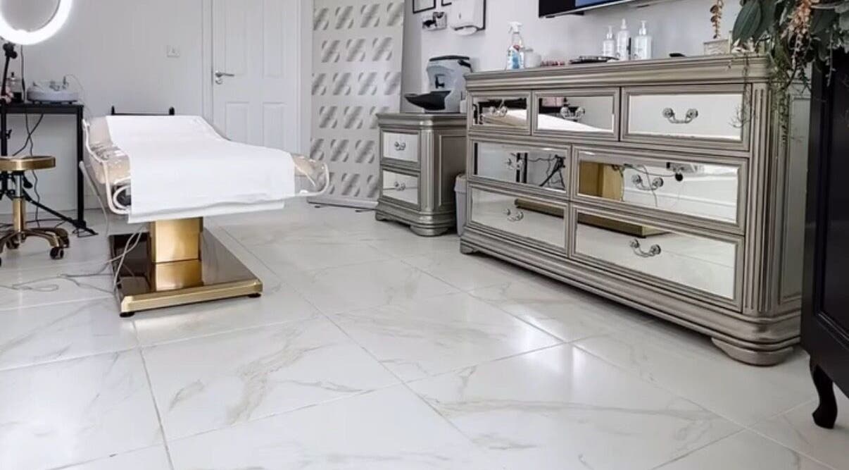 Elegant treatment room at Aesthetics By Rachel Haq, Oldham, England, GB with sleek decor and state-of-the-art equipment.