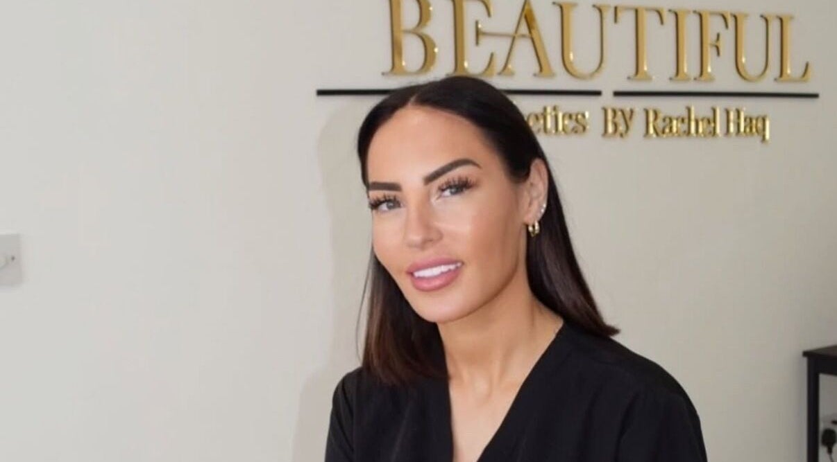 Aesthetician at Aesthetics By Rachel Haq in Oldham, England, GB with the BEAUTIFUL sign in the background.