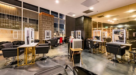 Modern interior of S Parlor Hair, Melbourne, Victoria, AU, showcasing stylish salon chairs and mirrors.
