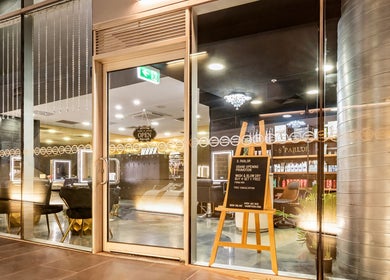 Elegant entrance of S Parlor Hair, Melbourne, Victoria, AU, with stylish interior and inviting decor.