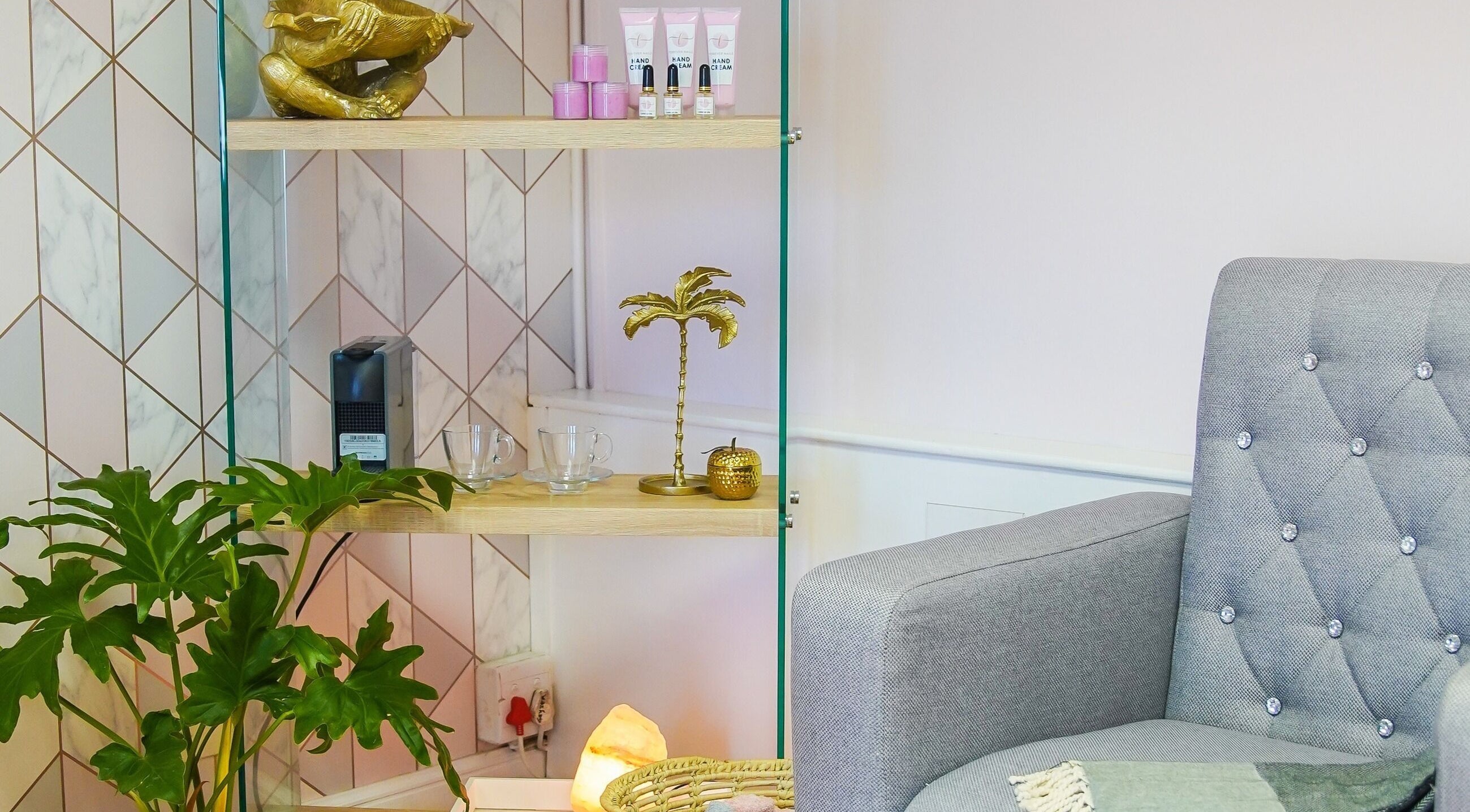 Elegant waiting area in Forever Nails Boutique, Umhlanga, Kwazulu-natal, ZA with stylish decor and comfy seating.