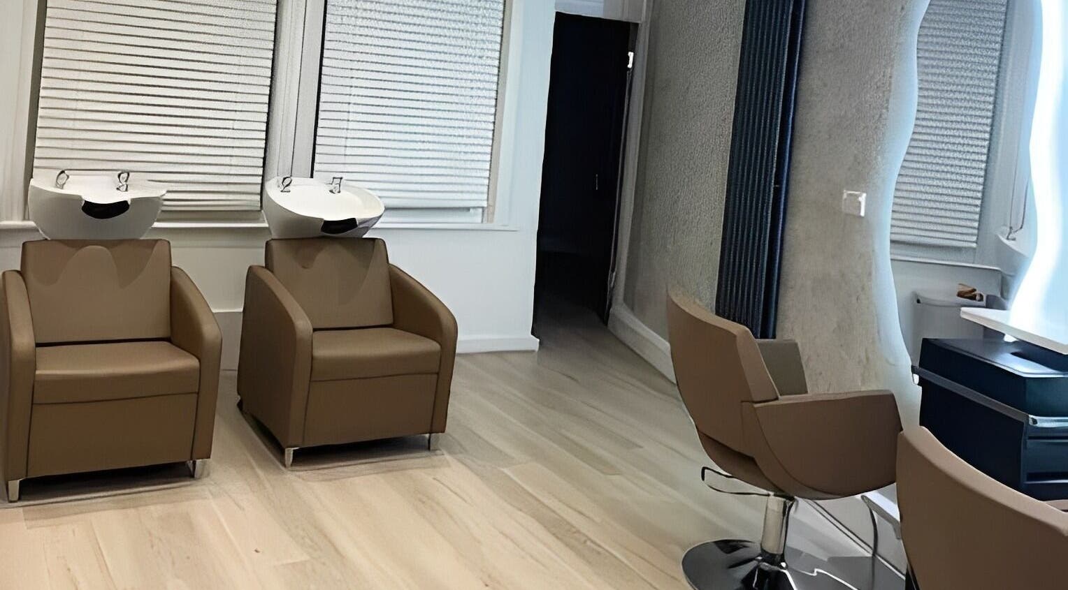 Modern hair washing stations at Glama salon, Enfield, England, GB, showcasing comfort and style.