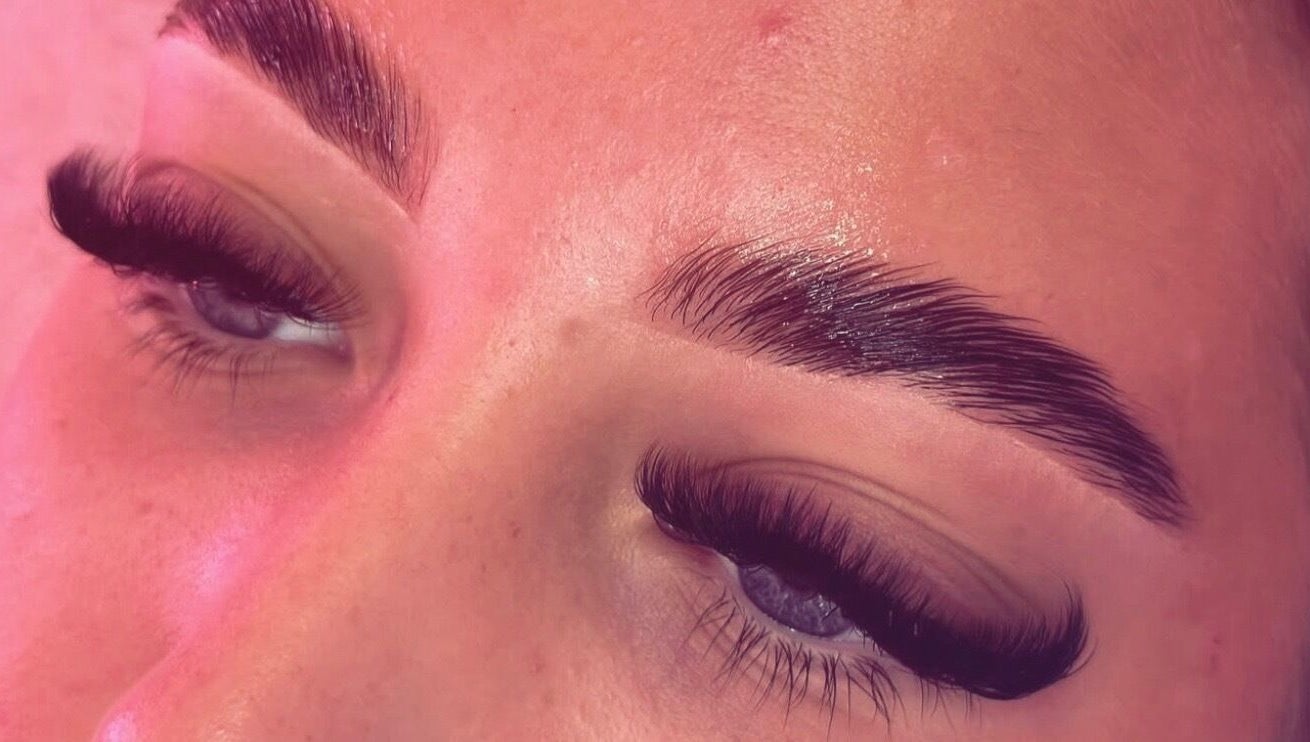 Close-up of beautifully styled eyelashes and eyebrows at MLG Extensions, Watford, England, GB.