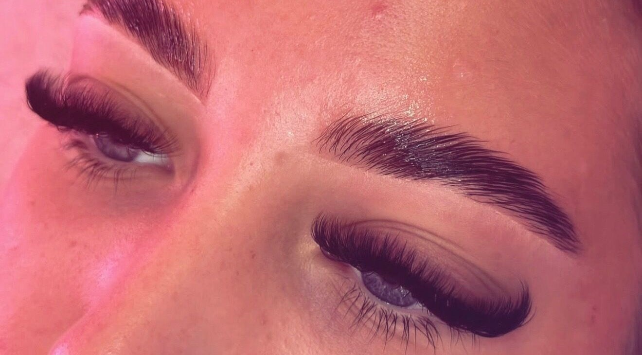Close-up of beautifully styled eyelashes and eyebrows at MLG Extensions, Watford, England, GB.
