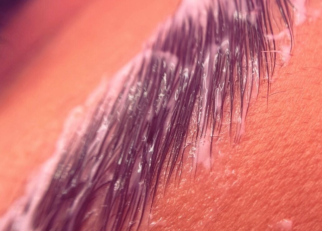 Close-up of brow treatment at MLG Extensions, Watford, England, GB, showing precision in detailing and care.