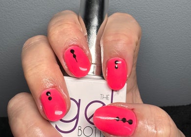 Bright pink nail art with black accents at The Rose Collection, Weston-super-mare, England, GB.