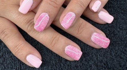 Elegant pink nails with glitter at The Rose Collection, Weston-super-Mare, England, GB.