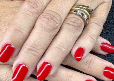 Red manicured nails at The Rose Collection, Weston-super-mare, England, GB.