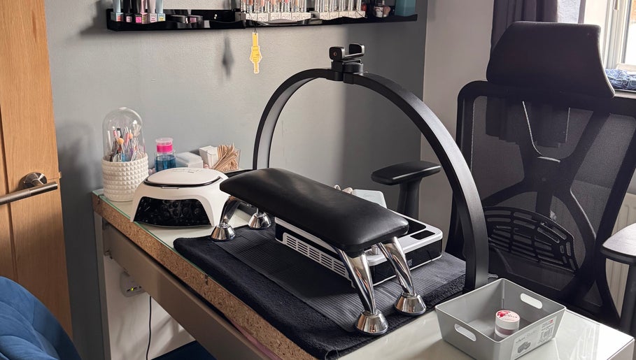 Nail station at The Rose Collection, Weston-super-mare, England, GB, featuring manicure tools and comfortable chair.