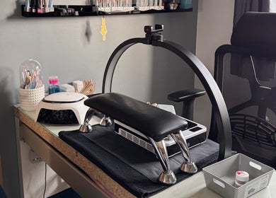 Nail station at The Rose Collection, Weston-super-mare, England, GB, featuring manicure tools and comfortable chair.