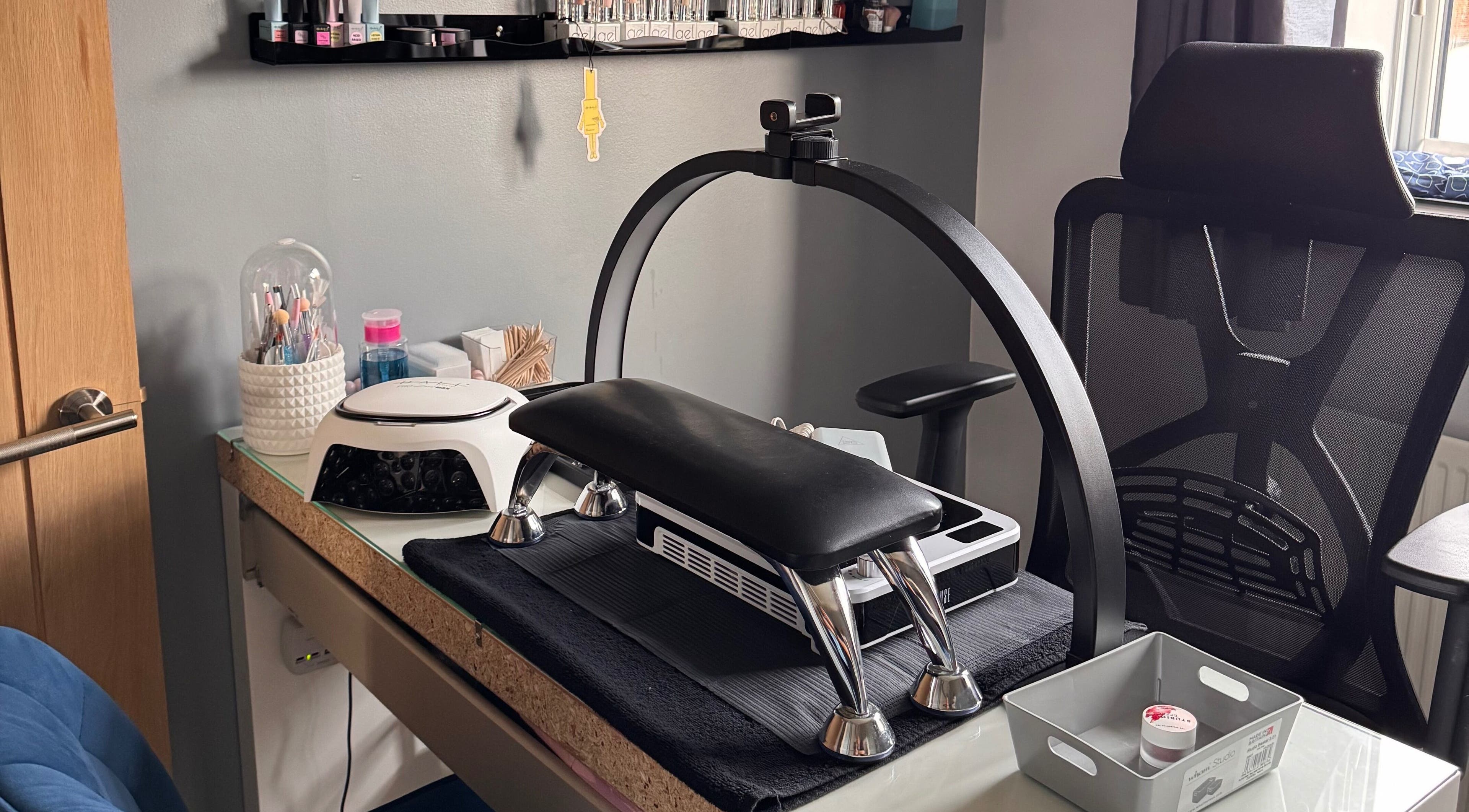 Nail station at The Rose Collection, Weston-super-mare, England, GB, featuring manicure tools and comfortable chair.