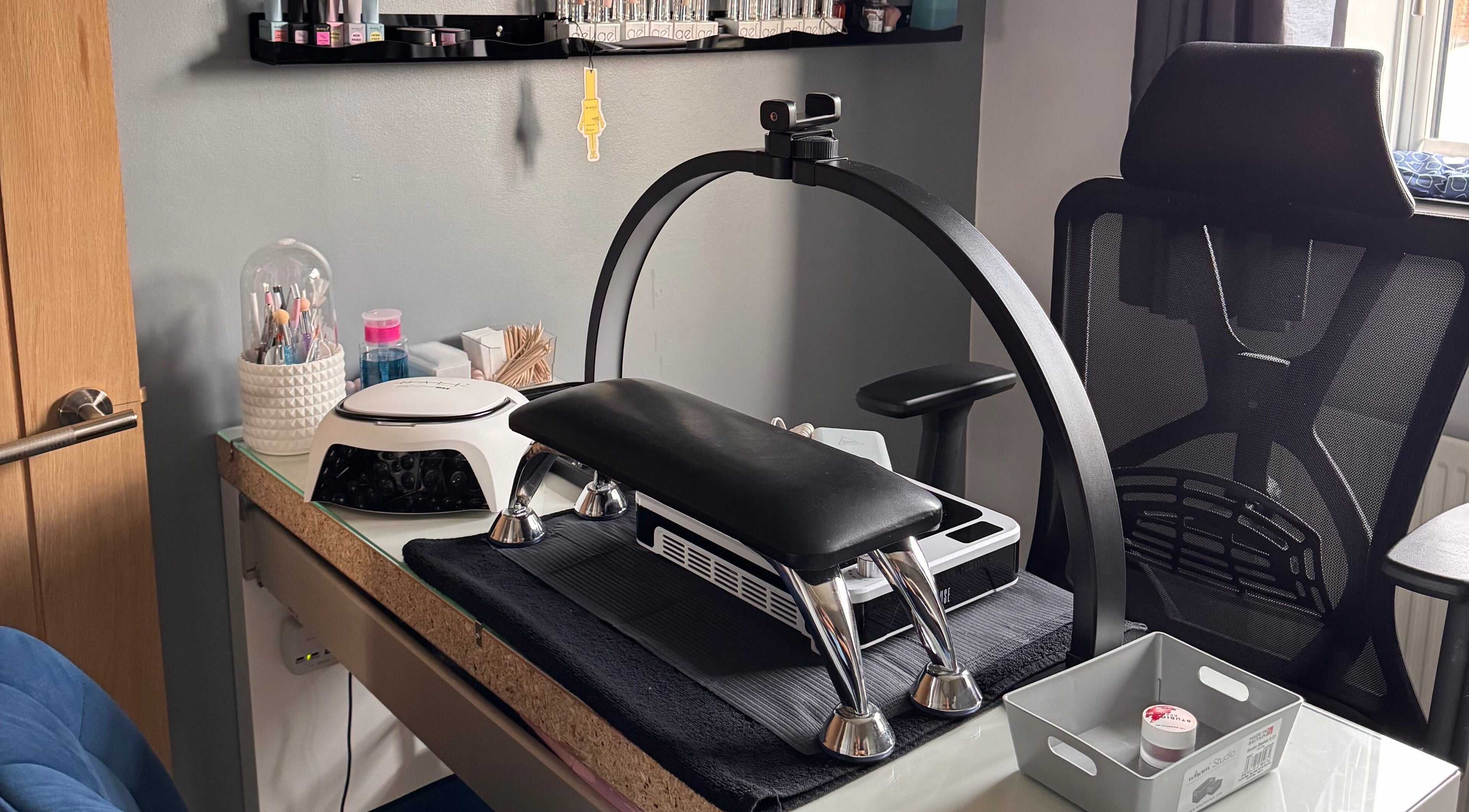 Nail station at The Rose Collection, Weston-super-mare, England, GB, featuring manicure tools and comfortable chair.