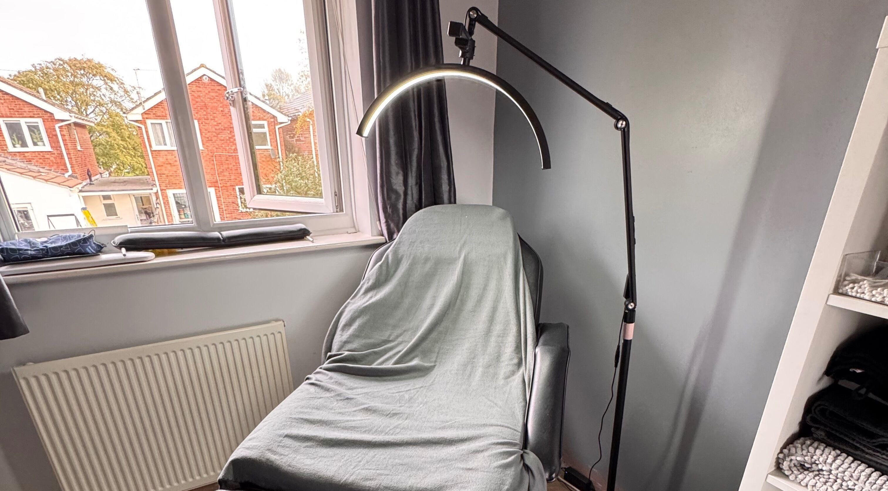 Relaxing treatment room at The Rose Collection, Weston-super-mare, England, GB, featuring a treatment chair.