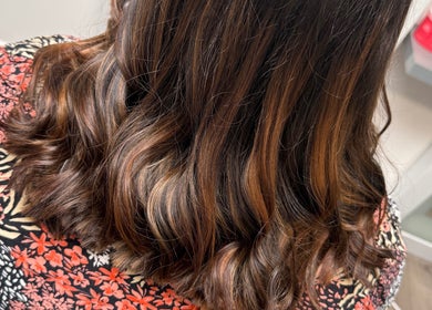 Beautifully styled brunette hair with soft curls at Hair by Jodie, Kilmarnock, Scotland, GB.