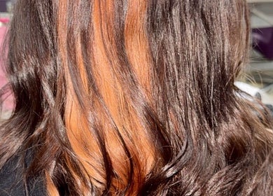 Vibrant hair highlights done at Hair by Jodie in Kilmarnock, Scotland, GB. Stunning brown and copper tones.