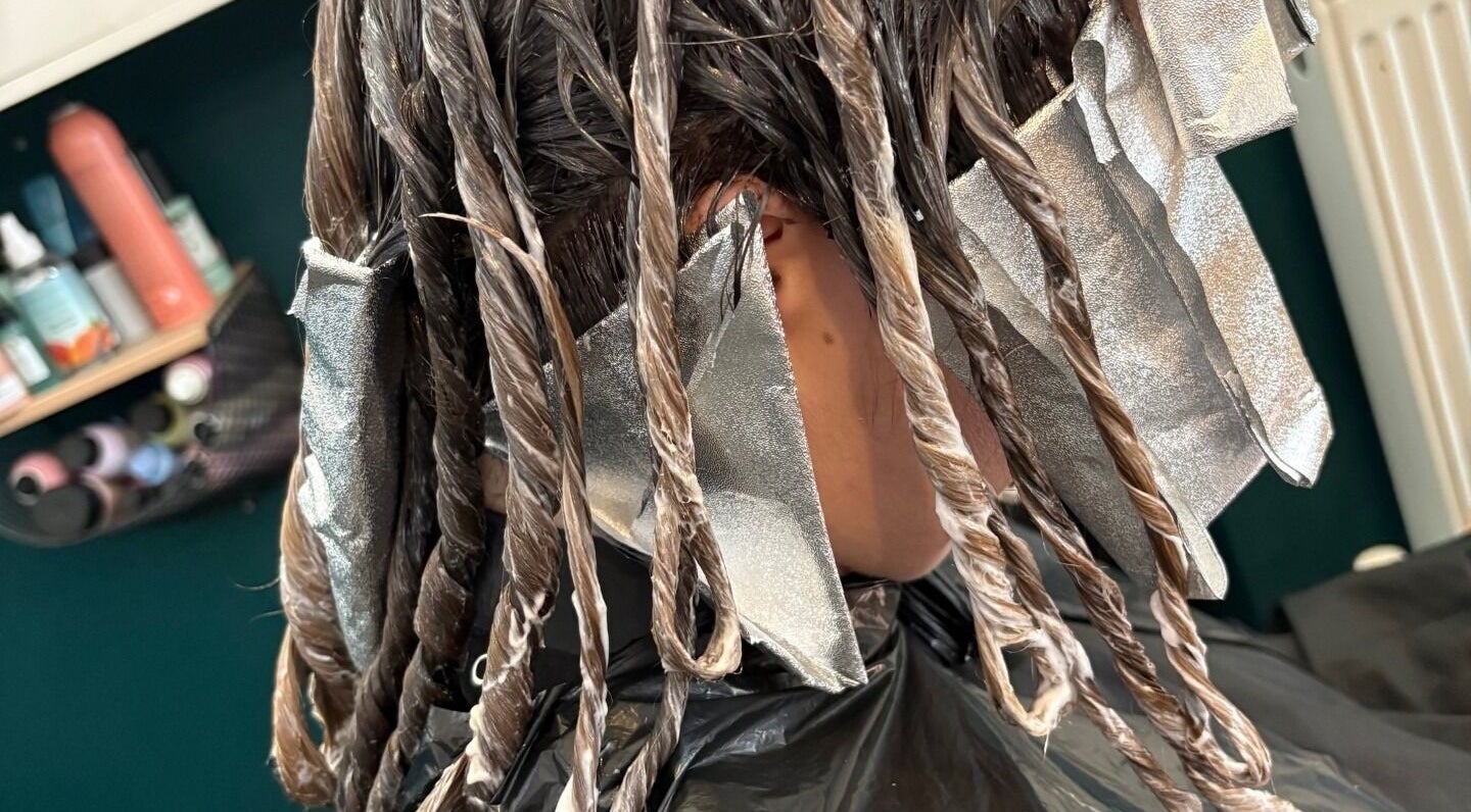 Hair coloring in progress at Kay Sheriff Hair, Congleton, England, GB, showcasing expert technique.