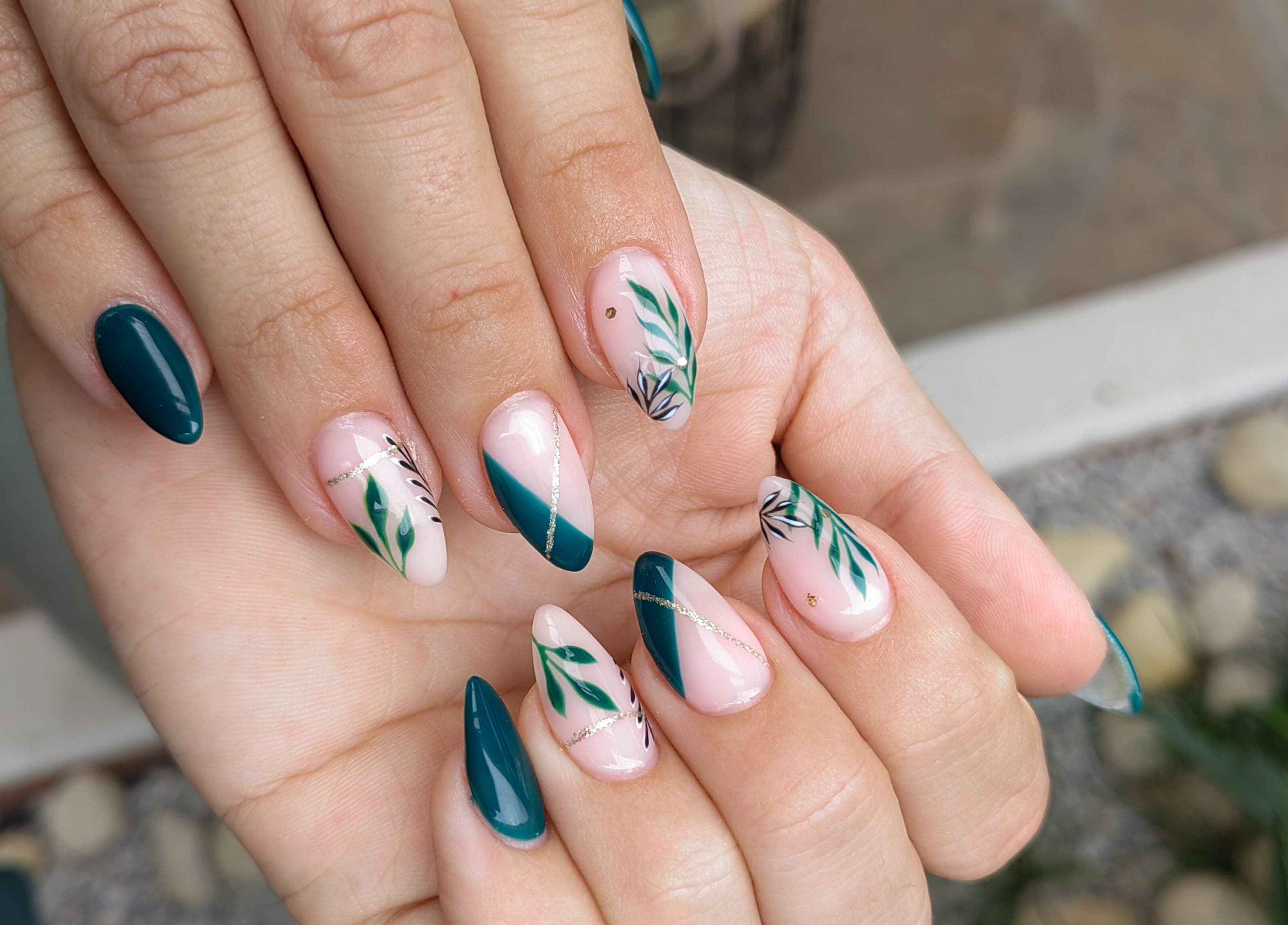 Elegant nail art featuring green and teal designs at Celesté and Madré at The Fountain, Port Elizabeth, Eastern Cape, ZA.