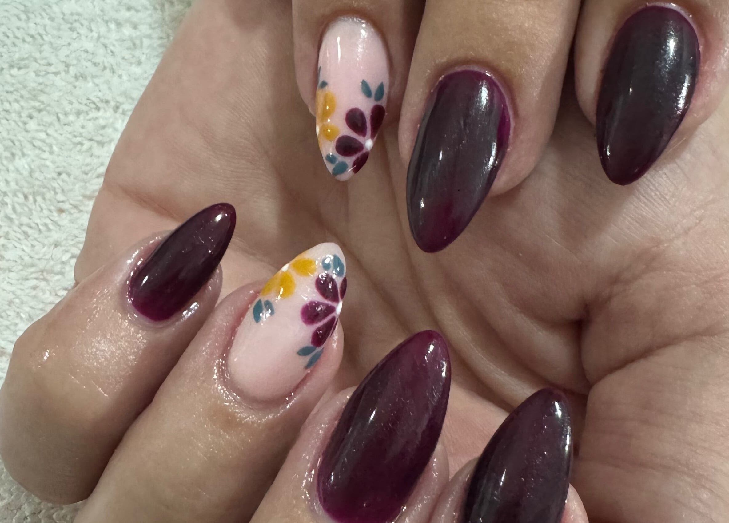 Elegant nail art with floral designs at Celesté and Madré at The Fountain, Port Elizabeth, Eastern Cape, ZA.