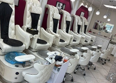 Luxurious nail salon chairs at Banusti Beauty Nails in Burlington, Massachusetts, US.
