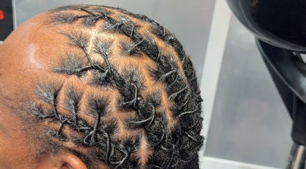 Intricate cornrow hairstyle at Banusti Beauty LLC, Billerica, Massachusetts, US, showcasing expert styling.