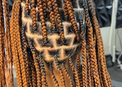 Detailed braiding hairstyle at Banusti Beauty LLC, Billerica, Massachusetts, US.