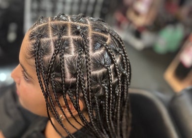 Detailed braided hairstyle at Banusti Beauty LLC in Billerica, Massachusetts, US.