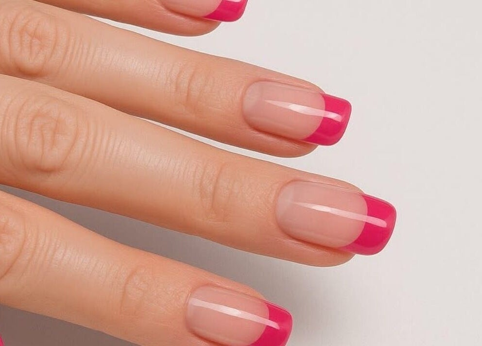 Bright pink French tips offered by Mobile Glam in Caerphilly, Wales, GB for stylish nail art enthusiasts.