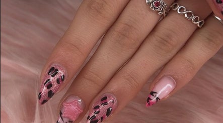 Stylish pink and black leopard nail art at arushisnails, Crawley, England, GB.