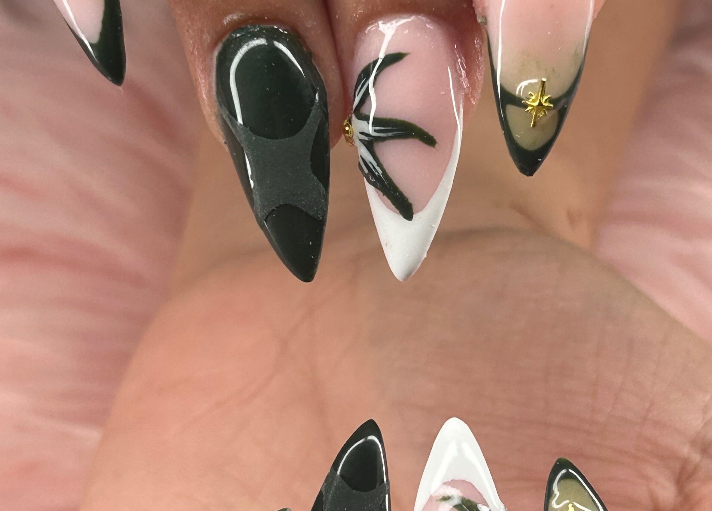 Elegant and intricate nail art design at arushisnails, Crawley, England, GB. Features black and white patterns.