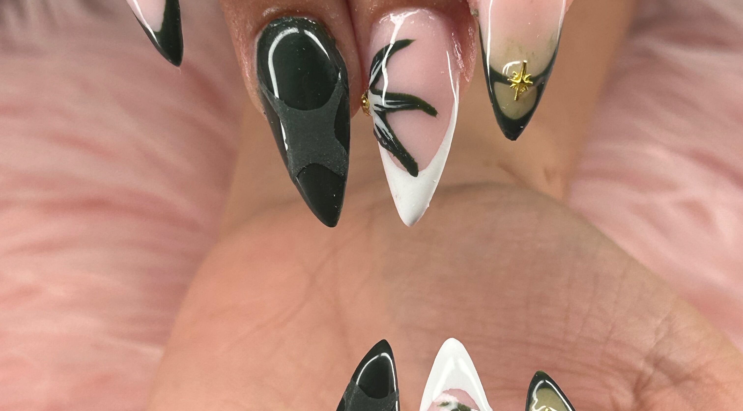 Elegant and intricate nail art design at arushisnails, Crawley, England, GB. Features black and white patterns.
