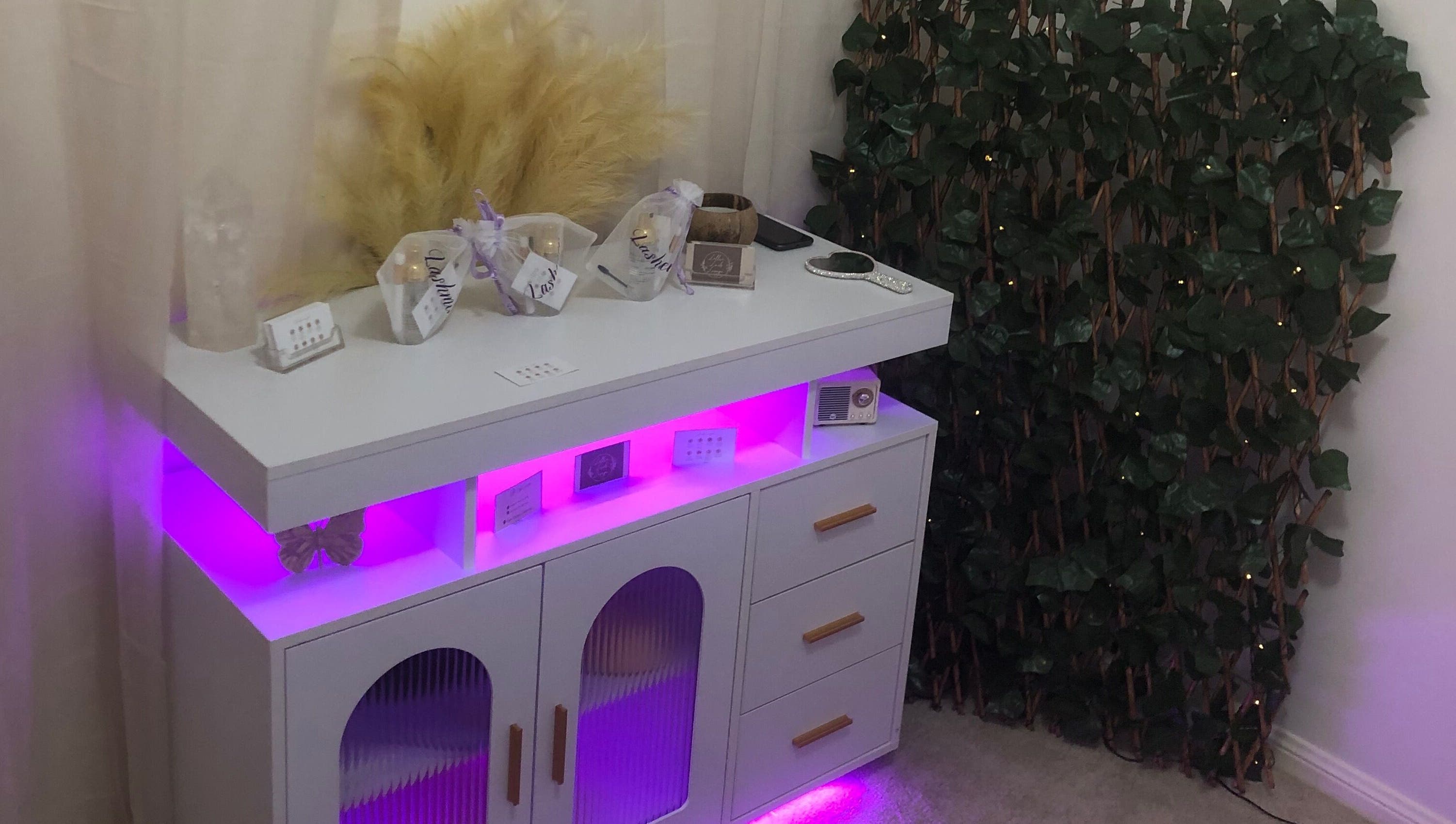 Elegant vanity display with soft lighting at Lollie Lash Lounge, Upper Coomera, Queensland, AU.