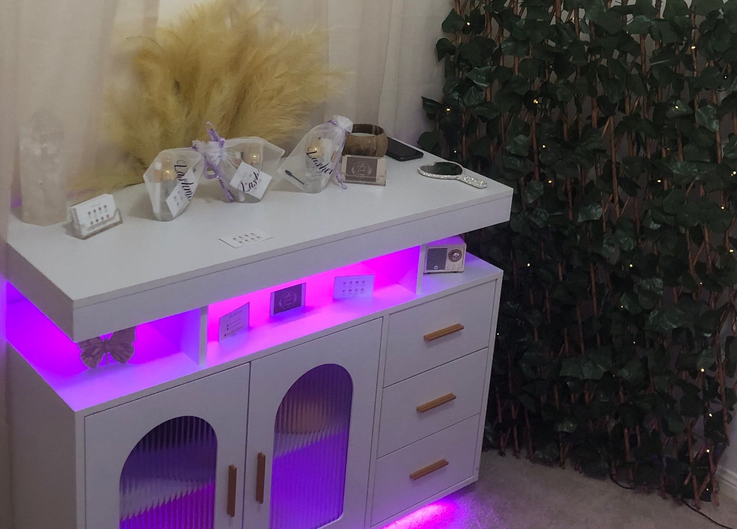 Elegant vanity display with soft lighting at Lollie Lash Lounge, Upper Coomera, Queensland, AU.