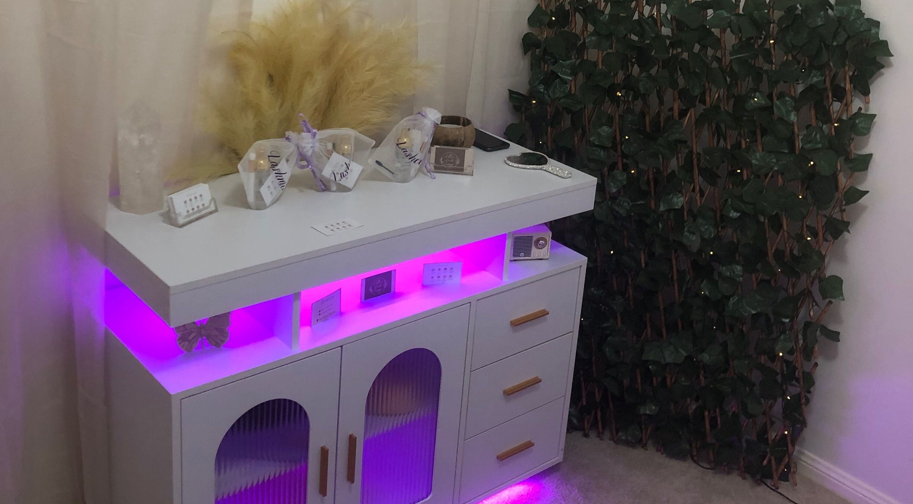 Elegant vanity display with soft lighting at Lollie Lash Lounge, Upper Coomera, Queensland, AU.