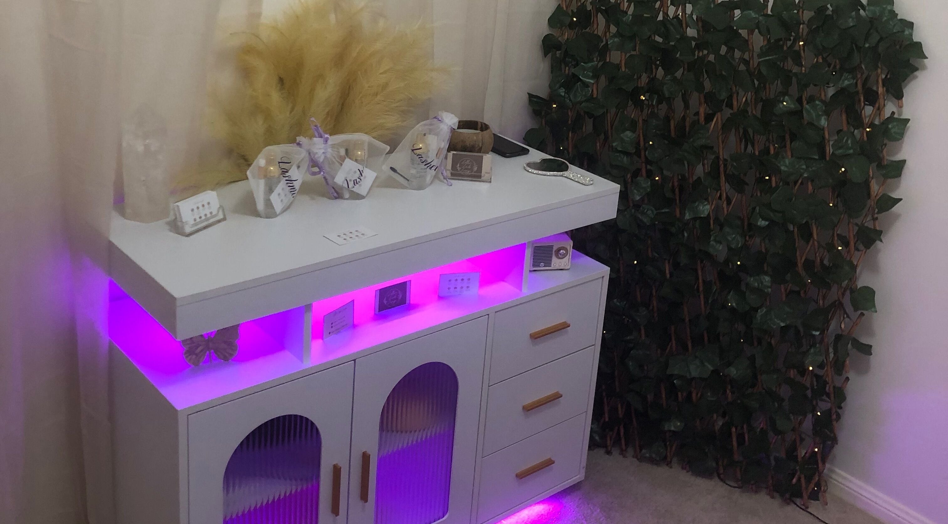 Elegant vanity display with soft lighting at Lollie Lash Lounge, Upper Coomera, Queensland, AU.