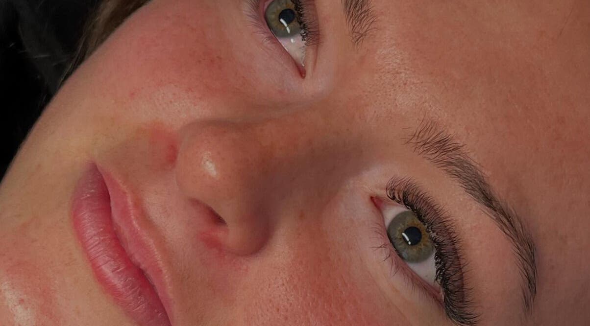 Close-up of a client's radiant face after treatment at Golden Beauty Bar, Peats Ridge, New South Wales, AU.
