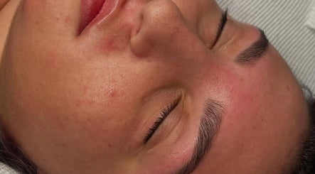 Close-up of a relaxed face post-facial at Golden Beauty Bar, Peats Ridge, New South Wales, AU.
