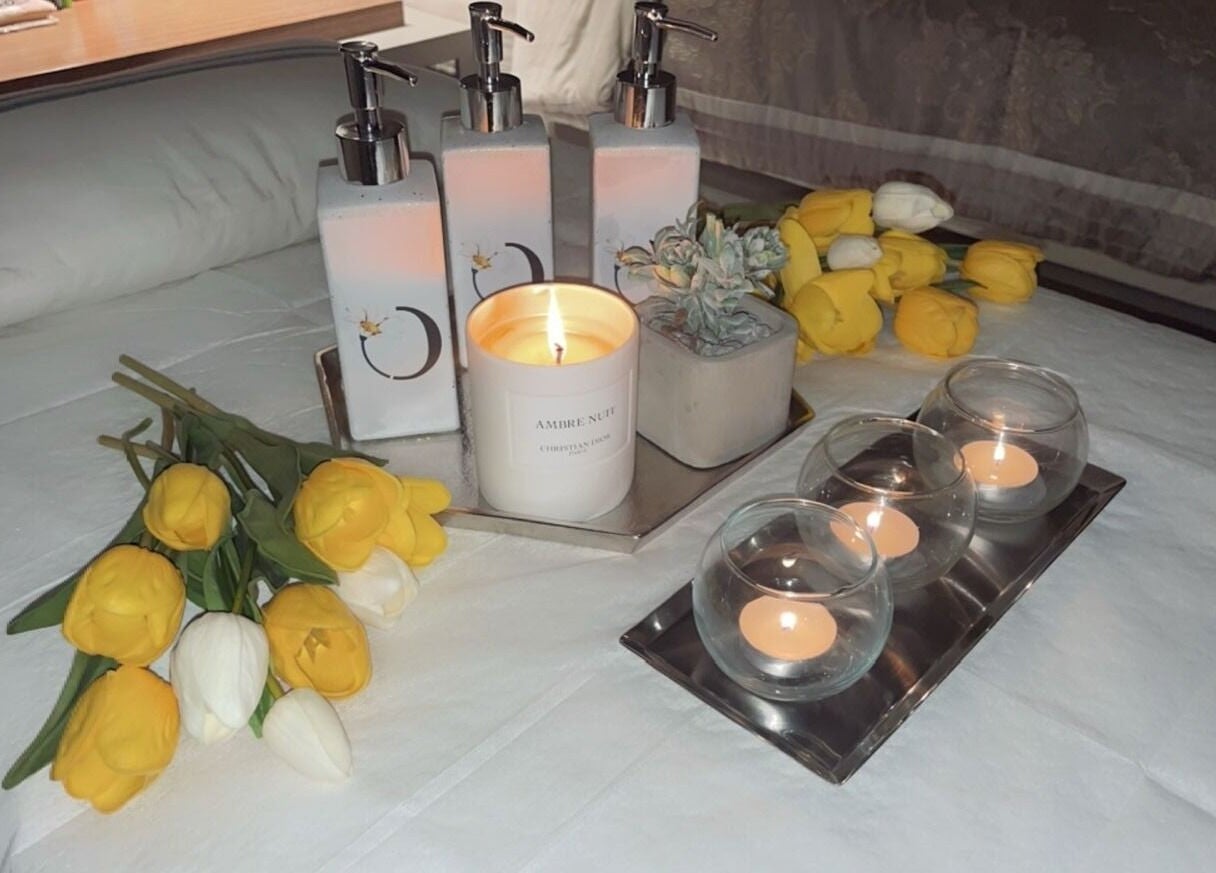 Relaxing candles and yellow tulips at Chamomile Spa | كامومايل هوم سبا, Riyadh, Eastern Province, SA.